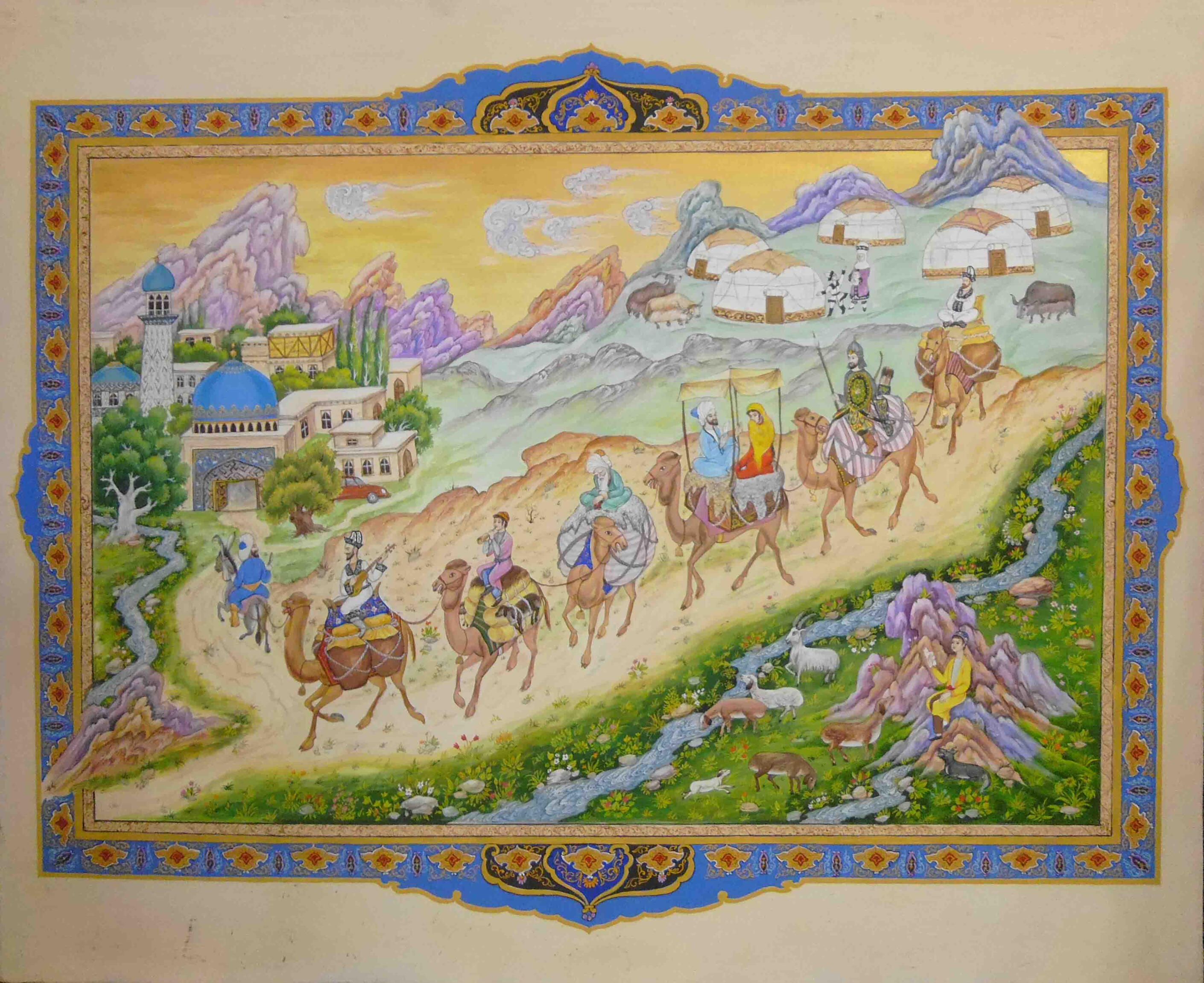 Photo of Olim Kamolzoda sitting at the desk in his workshop. He is the Honoured Artist of the Republic of Tajikistan, a Member of the Union of Artists of the Republic of Tajikistan, and a Specialist of the Miniature Art. Studying the specifics of the work