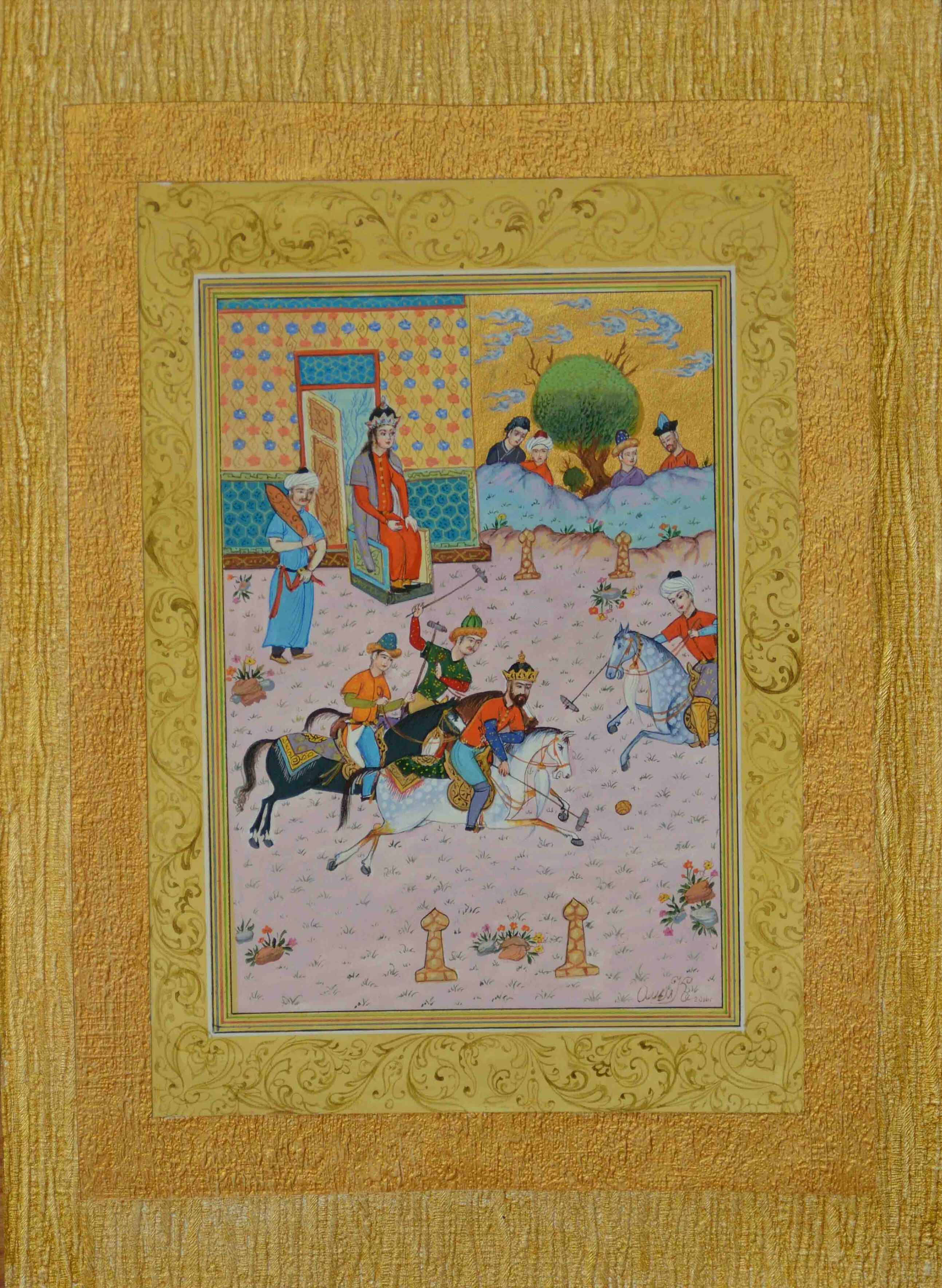 Photo of Olim Kamolzoda sitting at the desk in his workshop. He is the Honoured Artist of the Republic of Tajikistan, a Member of the Union of Artists of the Republic of Tajikistan, and a Specialist of the Miniature Art. Studying the specifics of the work